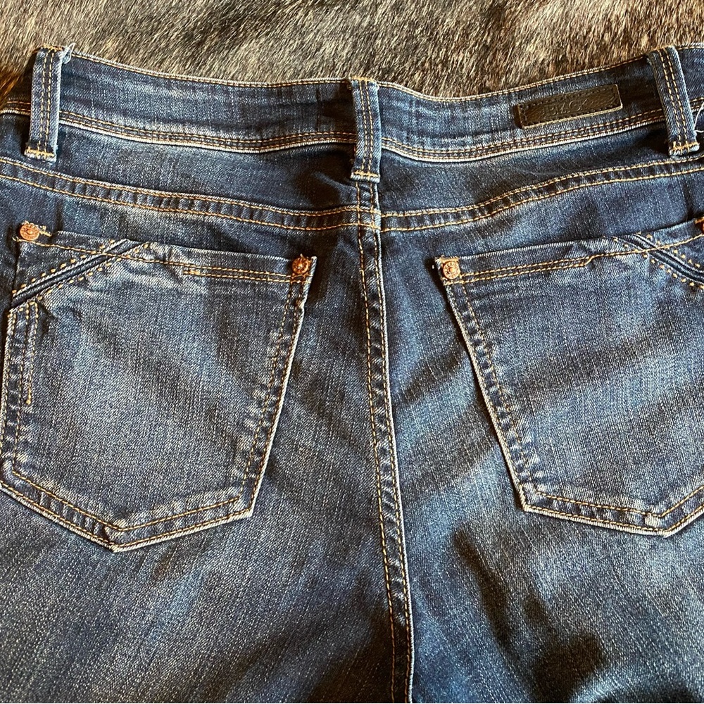Buckle Black Skinny Jeans. Love these, hugs your buns! Great Condition.